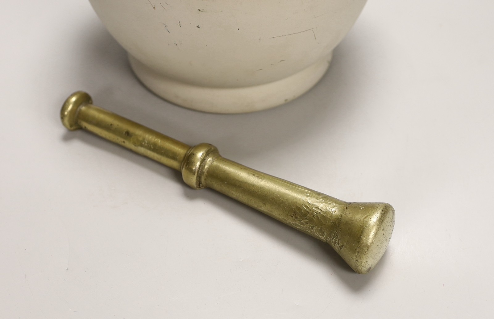 A bronze pestle and a Wedgwood ‘best composition’ mortar